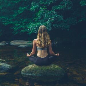 A woman relaxing and meditating 