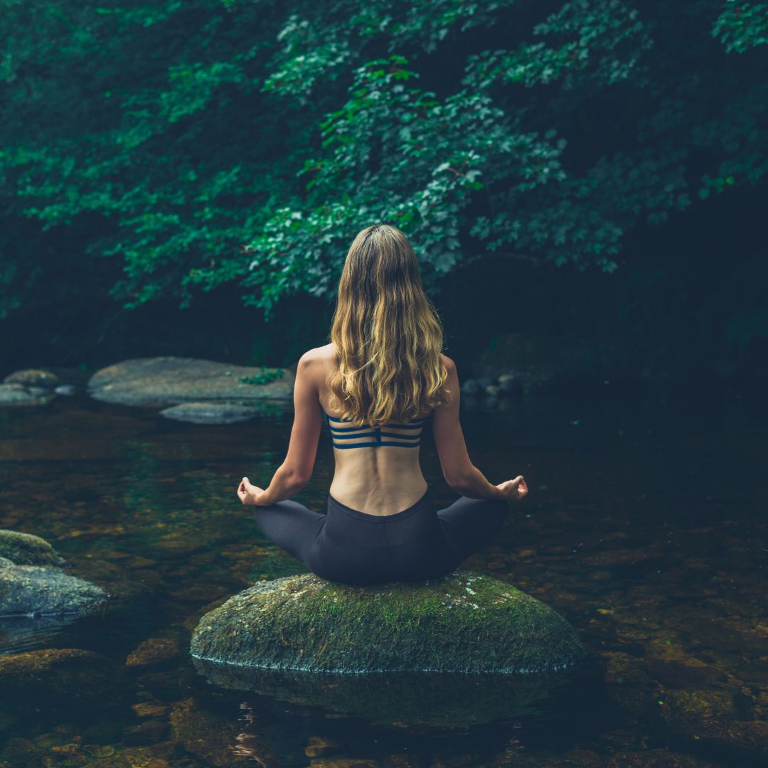 A woman relaxing and meditating